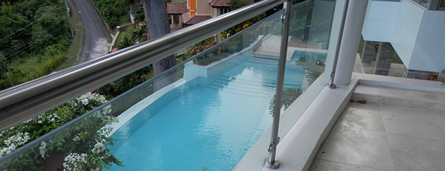 glass balustrade looking onto pool